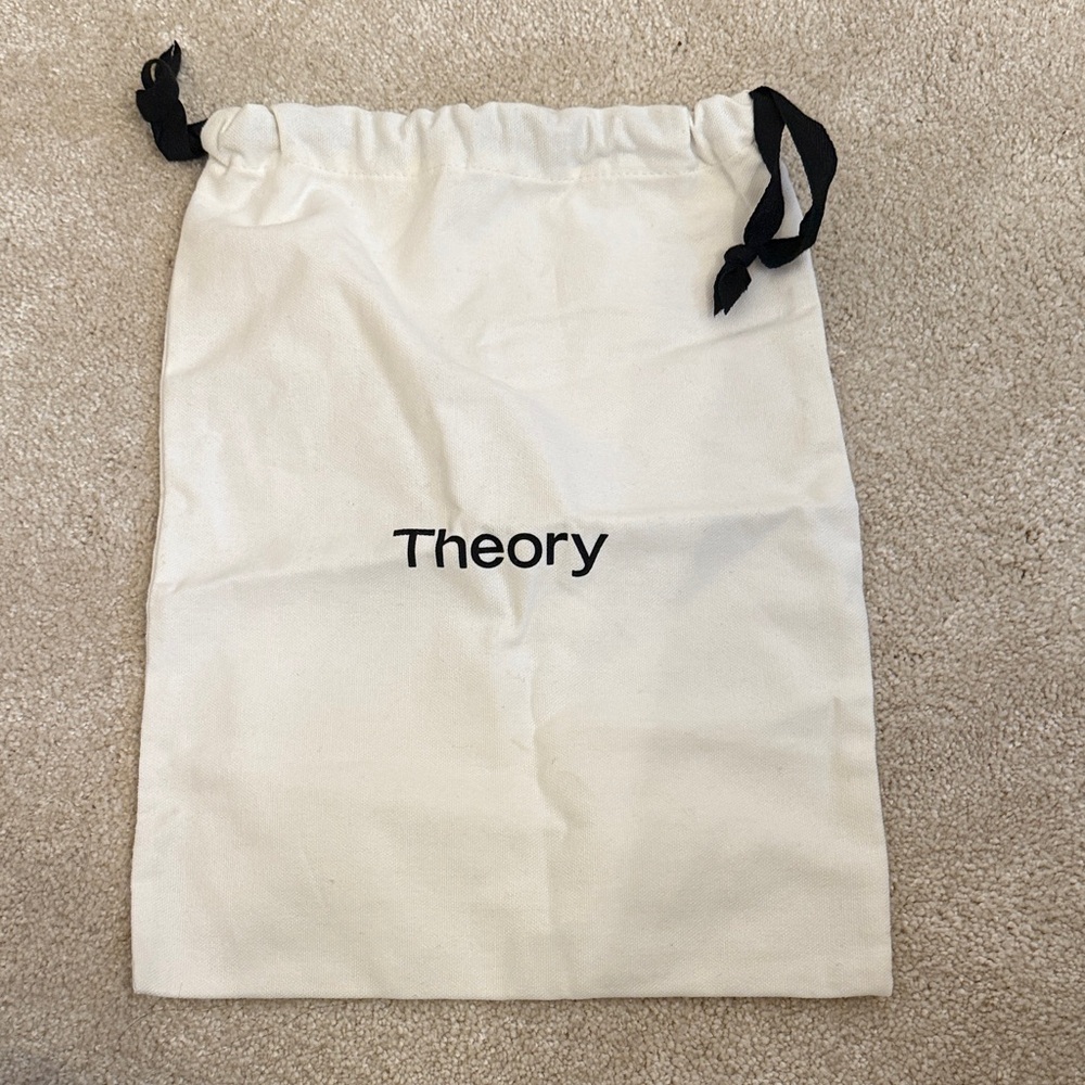 Theory Cream Drawstring Pouch with Black Ties